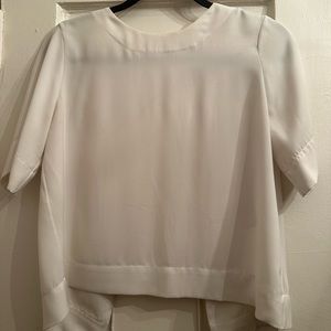 Sandro Crewneck tie back blouse in a soft white